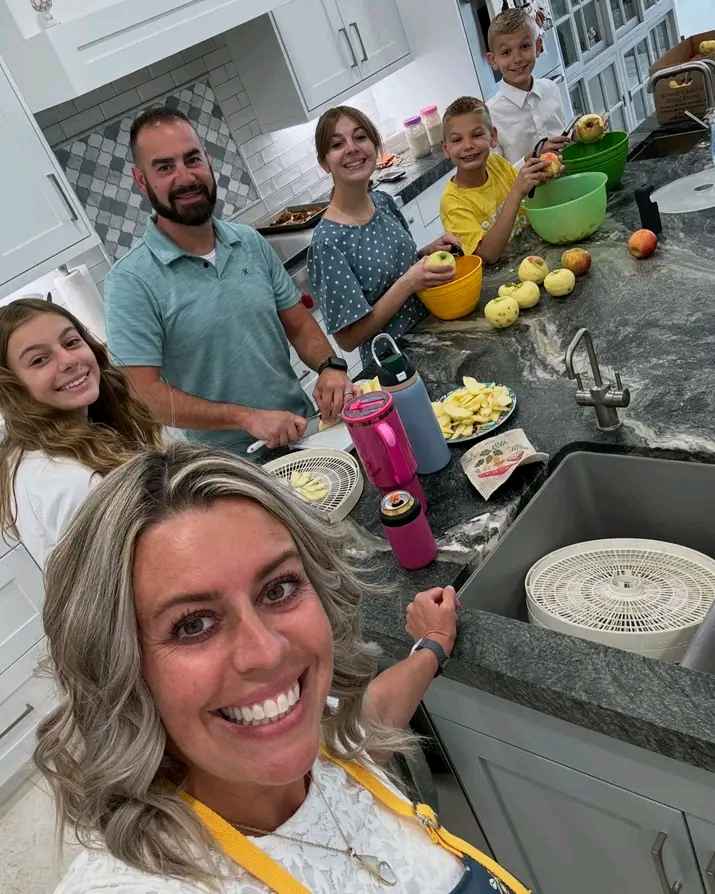 Image - Canyon Tannerites in a family photo with his parents and siblings. 