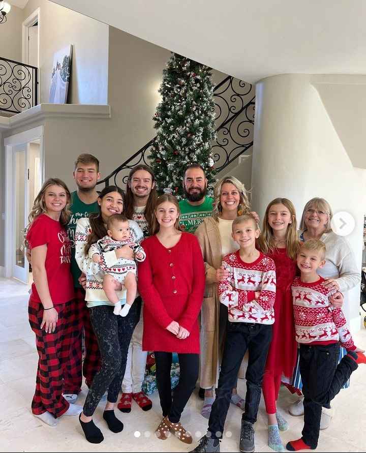 Image - Allie Rose in a Christmas family photo with her parents, Johnny & Sarah, her three brothers, Branson, AZ, and Canyon, her three sisters, Savannah, Daniell, and Lizzy, her sister-in-law, Mara, her nephew, Neymar, and grandma. 