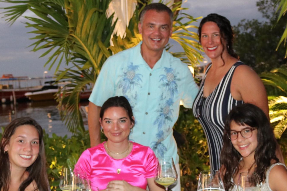 Image - Natalie Noel in a family photo at family dinner with her parents, Homer and Jenn Mariduena, and two sisters, Isa and Lauren Mariduena. 